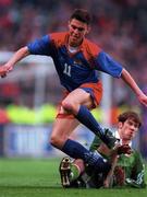 21 May 1997; Daniel Frick of Liechtenstein is tackled by Kenny Cunningham of Republic of Ireland during the FIFA World Cup 1998 Group 8 Qualifying match between Republic of Ireland and Liechtenstein at Lansdowne Road in Dublin. Photo by Brendan Moran/Sportsfile