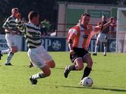 20 September 1998; Michael McHugh of Derry City in action against Tommy Dunne of Shamrock Rovers during the Harp Lager National League Premier Division match between Shamrock Rovers and Derry City at Tolka Park in Dublin. Photo by Brendan Moran/Sportsfile