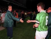 14 October 1998; Republic of Ireland manager Mick McCarthy and Roy Keane shake hands following the UEFA EURO 2000 Group 8 Qualifying match between Republic of Ireland and Malta at Lansdowne Road in Dublin. Photo by David Maher/Sportsfile