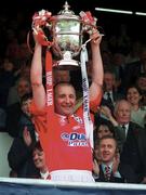 4 May 1997; Shelbourne captain Mick Neville lifts the FAI Cup following his side's victory during the FAI Cup Final match between Derry City and Shelbourne at Dalymount Park in Dublin. Photo by Brendan Moran/Sportsfile