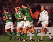 14 October 1998; Niall Quinn of Republic of Ireland, right, is congratulated by team-mate Robbie Keane after scoring his side's fourth goal during the UEFA EURO 2000 Group 8 Qualifying match between Republic of Ireland and Malta at Lansdowne Road in Dublin. Photo by David Maher/Sportsfile