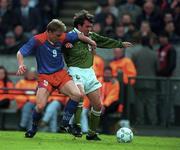 21 May 1997; Ray Houghton of Republic of Ireland in action against Christoph Frick of Liechtenstein during the FIFA World Cup 1998 Group 8 Qualifying match between Republic of Ireland and Liechtenstein at Lansdowne Road in Dublin. Photo by Brendan Moran/Sportsfile