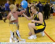 1 February 2004; University of Limerick's Michelle Aspell and her son Jordan, aged 4, celebrate with the ESB Cup after victory over Bausch and Lomb Wildcats. ESB National Cup 2004, Senior Women's Final, University of Limerick v Bausch and Lomb Wildcats, The ESB Arena, Tallaght, Dublin. Picture credit; Brendan Moran / SPORTSFILE *EDI*