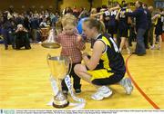 1 February 2004; University of Limerick's Michelle Aspell and her son Jordan, aged 4, celebrate with the ESB Cup after victory over Bausch and Lomb Wildcats. ESB National Cup 2004, Senior Women's Final, University of Limerick v Bausch and Lomb Wildcats, The ESB Arena, Tallaght, Dublin. Picture credit; Brendan Moran / SPORTSFILE *EDI*