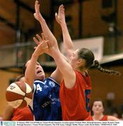 31 January 2004; Lisa O'Sullivan, Vienna Woods Glanmire, in action against Vivienne Shaw, Drimagh Dynamos. Junior Women's Final, Drimagh Dynamos v Vienna Woods Glanmire, The ESB Arena, Tallaght, Dublin. Picture credit; David Maher / SPORTSFILE *EDI*