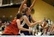 31 January 2004; Kathryn Fahy, Vienna Woods Glanmire, in action against Janet Byrne and Emer Foley, Drimagh Dynamos. Junior Women's Final, Drimagh Dynamos v Vienna Woods Glanmire, The ESB Arena, Tallaght, Dublin. Picture credit; David Maher / SPORTSFILE *EDI*