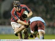 31 January 2004; Paul O'Connell, Munster, is tackled by Julie Bonnaire, Bourgoin. Heineken European Cup 2003-2004, Pool 5, Round 6, Munster v Bourgoin, Thomond Park, Limerick. Picture credit; Matt Browne / SPORTSFILE *EDI*