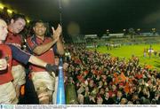 31 January 2004; Munster captain Jim Williams, Anthony Foley and Peter Stringer celebrates the win against Bourgoin at the final whistle. Heineken European Cup 2003-2004, Pool 5, Round 6, Munster v Bourgoin, Thomond Park, Limerick. Picture credit; Matt Browne / SPORTSFILE *EDI*