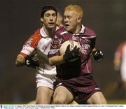 31 January 2004; Paul Martin, Westmeath, in action against Bernie Collins Cork. Allianz National Football League Division 1A, Cork v Westmeath, Pairc Ui Rinn, Cork. Picture credit; Damien Eagers / SPORTSFILE *EDI*