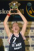 3 February 2004; Sinead Roche, St Mary's, Ballina captain, lifts the cup after victory over Grennan College, Thomastown. All-Ireland Schools Cup Basketball, Under 19 C Final, Grennan College, Thomastown, Thomastown, Co. Kilkenny v St Mary's, Ballina, Co. Mayo, The ESB Arena, Tallaght, Dublin. Picture credit; Damien Eagers / SPORTSFILE *EDI*