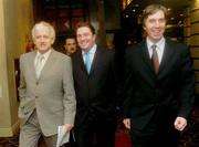 3 February 2004; FAI President, Milo Corcoran, left, with Fran Rooney, centre, Chief Executive FAI, and John Delaney, Treasurer, FAI,  at the end of a fixtures meeting in the Burlington Hotel, Dublin, for the 2006 FIFA World Cup Qualifying games involving France, Republic of Ireland, Switzerland, Israel, Cyprus, Faroe Islands. Picture credit; David Maher / SPORTSFILE *EDI*