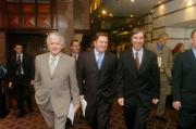3 February 2004; FAI President, Milo Corcoran, lefts, with Fran Rooney, centre, Chief Executive FAI and John Delaney, Treasurer, FAI,  at the end of a fixtures meeting in the Burlington Hotel, Dublin, for the 2006 FIFA World Cup Qualifying games involving France, Republic of Ireland, Switzerland, Israel, Cyprus, Faroe Islands. Picture credit; David Maher / SPORTSFILE *EDI*