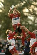 31 January 2004; Biarritz Olympiques Thomas Lievremont with help from team-mates David Couzinet, left, and Herve Manet, right, wins possession in the line-out against the Leinster Lions. Heineken European Cup 2003-2004, Pool 3, Round 6, Biarritz Olympique v Leinster Lions, Parc des Sports Aguilera, Biarritz, France. Picture credit; Pat Murphy / SPORTSFILE *EDI*
