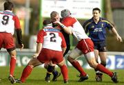 31 January 2004; Victor Costello, Leinster Lions, in action against Herve Manet, right, Jean Michel Gonzalez, 2, and Dimitri Yachvili, Biarritz Olympique. Heineken European Cup 2003-2004, Pool 3, Round 6, Biarritz Olympique v Leinster Lions, Parc des Sports Aguilera, Biarritz, France. Picture credit; Pat Murphy / SPORTSFILE *EDI*
