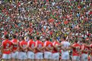 7 July 2013; A general view of supporters standing for the national anthem before the game. Munster GAA Football Senior Championship Final, Kerry v Cork, Fitzgerald Stadium, Killarney, Co. Kerry. Picture credit: Barry Cregg / SPORTSFILE