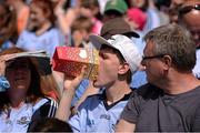 7 July 2013; A Dublin supporter tucks into his box of popcorn before the game. Leinster GAA Hurling Senior Championship Final, Galway v Dublin, Croke Park, Dublin. Picture credit: Ray McManus / SPORTSFILE