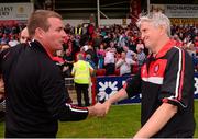 6 July 2013; Down manager James McCartan, left, shakes hands with Derry manager Brian McIver after the game. GAA Football All-Ireland Senior Championship, Round 2, Derry v Down, Celtic Park, Derry. Photo by Sportsfile