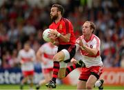 6 July 2013; Conor Laverty, Down, in action against Seán Leo McGoldrick, Derry. GAA Football All-Ireland Senior Championship, Round 2, Derry v Down, Celtic Park, Derry. Photo by Sportsfile