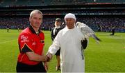 7 July 2013; Referee Johnny Ryan shakes hands with falconer Bryan Paterson and his Gyrfalcon 'Fern' before the game. Leinster GAA Hurling Senior Championship Final, Galway v Dublin, Croke Park, Dublin. Picture credit: Ray McManus / SPORTSFILE