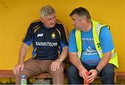 6 July 2013; Clare manager Mick O'Dwyer in conversation with steward Mike Considine before the game. GAA Football All-Ireland Senior Championship, Round 2, Clare v Laois, Cusack Park, Ennis, Co. Clare. Picture credit: Diarmuid Greene / SPORTSFILE