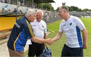 6 July 2013; Clare manager Mick O'Dwyer exchanges a handshake with Peter O'Neill, Laois County Board vice-chairman, in the company of Olly Byrne, Laois Football County Board secretary, centre. GAA Football All-Ireland Senior Championship, Round 2, Clare v Laois, Cusack Park, Ennis, Co. Clare. Picture credit: Diarmuid Greene / SPORTSFILE