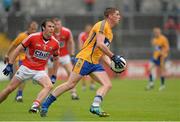 16 June 2013; Ian McInerney, Clare, in action against James Loughrey, Cork. Munster GAA Football Senior Championship Semi-Final, Clare v Cork, Cusack Park, Ennis, Co. Clare. Picture credit: Matt Browne / SPORTSFILE