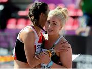 11 July 2013; Team Ireland's Catherine McManus, right, is congratulated by Switzerland's Fanette Humair after winning her round 1 heat of the Women's 100m equalling her personal best time of 11:74sec. European Athletics U23 Championships, Tampere, Finland. Photo by Sportsfile