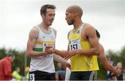 2 July 2013; Paul Byrne, Ireland, and first place Cornel Fredericks, South Africa, exchange a handshake after the Men's 400m hurdles at the 62nd Cork City Sports. Cork Institute of Technology, Bishopstown, Cork. Picture credit: Diarmuid Greene / SPORTSFILE