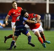 26 February 2021; Kevin O'Byrne of Munster is tackled by Jamie Hill of Cardiff Blues during the Guinness PRO14 match between Cardiff Blues and Munster at Cardiff Arms Park in Cardiff, Wales. Photo by Chris Fairweather/Sportsfile