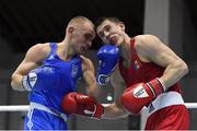 26 February 2021; Yevhenii Barabanov of Ukraine, left, and Dmitri Galagot of Moldova during their men's welterweight 69kg semi-final with  bout at the AIBA Strandja Memorial Boxing Tournament in Sofia, Bulgaria. Photo by Alex Nicodim/Sportsfile