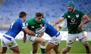 27 February 2021; Jordan Larmour of Ireland, supported by team-mate Will Connors, is tackled by Juan Ignacio Brex and Luca Sperandio of Italy during the Guinness Six Nations Rugby Championship match between Italy and Ireland at Stadio Olimpico in Rome, Italy. Photo by Roberto Bregani/Sportsfile