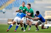 27 February 2021; Billy Burns of Ireland in action against Montanna Ioane and Carlo Canna of Italy during the Guinness Six Nations Rugby Championship match between Italy and Ireland at Stadio Olimpico in Rome, Italy. Photo by Roberto Bregani/Sportsfile