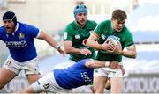 27 February 2021; Garry Ringrose of Ireland is tackled by Carlo Canna of Italy during the Guinness Six Nations Rugby Championship match between Italy and Ireland at Stadio Olimpico in Rome, Italy. Photo by Roberto Bregani/Sportsfile