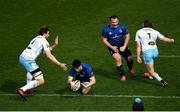 28 February 2021; Harry Byrne of Leinster dives over to score his side's first try despite the tackle of Richie Gray of Glasgow Warriors during the Guinness PRO14 match between Leinster and Glasgow Warriors at the RDS Arena in Dublin. Photo by Harry Murphy/Sportsfile