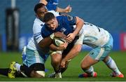 28 February 2021; Scott Penny of Leinster is tackled by Leone Nakarawa, left, and Enrique Pieretto of Glasgow Warriors  during the Guinness PRO14 match between Leinster and Glasgow Warriors at the RDS Arena in Dublin. Photo by Ramsey Cardy/Sportsfile