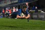 28 February 2021; Luke McGrath of Leinster dives over to score his side's fifth try during the Guinness PRO14 match between Leinster and Glasgow Warriors at the RDS Arena in Dublin. Photo by Ramsey Cardy/Sportsfile