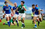 27 February 2021; Hugo Keenan of Ireland breaks through the Italy defence on the way to scoring his side's first try during the Guinness Six Nations Rugby Championship match between Italy and Ireland at Stadio Olimpico in Rome, Italy. Photo by Roberto Bregani/Sportsfile