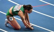 5 March 2021; Sophie Becker of Ireland checks her spikes after finishing third in her heat of the Women's 400m during the first session on day one of the European Indoor Athletics Championships at Arena Torun in Torun, Poland. Photo by Sam Barnes/Sportsfile