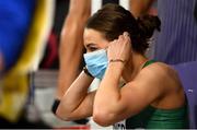 5 March 2021; Sophie Becker of Ireland puts on her facemask after finishing third in her heat of the Women's 400m during the first session on day one of the European Indoor Athletics Championships at Arena Torun in Torun, Poland. Photo by Sam Barnes/Sportsfile