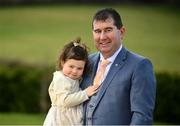 6 March 2021; Mícheál Naughton, Uachtarán, LGFA, poses with his daughter Erin after being presented with his Presidential medal by his wife, Annette, at the family home in county Donegal. Mícheál Naughton was inaugurated as the new President of the Ladies Gaelic Football Association at 2021 Annual Congress, which was held remotely due to Covid-19 restrictions. Photo by Stephen McCarthy/Sportsfile