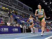 5 March 2021; Sophie Becker of Ireland crosses the line to finish third behind in her heat of the Women's 400m during the first session on day one of the European Indoor Athletics Championships at Arena Torun in Torun, Poland. Photo by Sam Barnes/Sportsfile