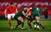 5 March 2021; James Cronin of Munster is tackled by Dave Heffernan, left, and Denis Buckley of Connacht during the Guinness PRO14 match between Munster and Connacht at Thomond Park in Limerick. Photo by David Fitzgerald/Sportsfile