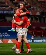 5 March 2021; Mike Haley, left, celebrates with Munster team-mates Craig Casey and Jack O'Donoghue after scoring his side's second try during the Guinness PRO14 match between Munster and Connacht at Thomond Park in Limerick. Photo by Ramsey Cardy/Sportsfile