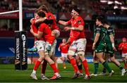 5 March 2021; Mike Haley of Munster celebrates with team-mates after scoring his side's second try during the Guinness PRO14 match between Munster and Connacht at Thomond Park in Limerick. Photo by Ramsey Cardy/Sportsfile