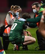5 March 2021; Jack Carty of Connacht receives medical assistance during the Guinness PRO14 match between Munster and Connacht at Thomond Park in Limerick. Photo by David Fitzgerald/Sportsfile