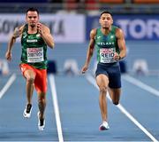6 March 2021; Denis Dimitrov of Bulgaria, left, and Leon Reid of Ireland compete in the Men's 60m heats during the first session on day two of the European Indoor Athletics Championships at Arena Torun in Torun, Poland. Photo by Sam Barnes/Sportsfile