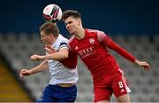 6 March 2021; Cian Coleman of Cork City in action against Oscar Brennan of Waterford during the pre-season friendly match between Waterford and Cork City at the RSC in Waterford. Photo by Seb Daly/Sportsfile