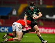 5 March 2021; Tom Daly of Connacht is tackled by Chris Farrell of Munster during the Guinness PRO14 match between Munster and Connacht at Thomond Park in Limerick. Photo by Ramsey Cardy/Sportsfile