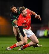 5 March 2021; Chris Farrell of Munster is tackled by Bundee Aki of Connacht during the Guinness PRO14 match between Munster and Connacht at Thomond Park in Limerick. Photo by Ramsey Cardy/Sportsfile