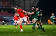 5 March 2021; Mike Haley of Munster on his way to scoring his side's second try despite the tackle of Paul Boyle of Connacht during the Guinness PRO14 match between Munster and Connacht at Thomond Park in Limerick. Photo by Ramsey Cardy/Sportsfile